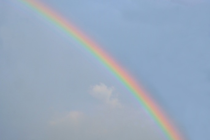 Rainbow crossing the sky physical phenomenon